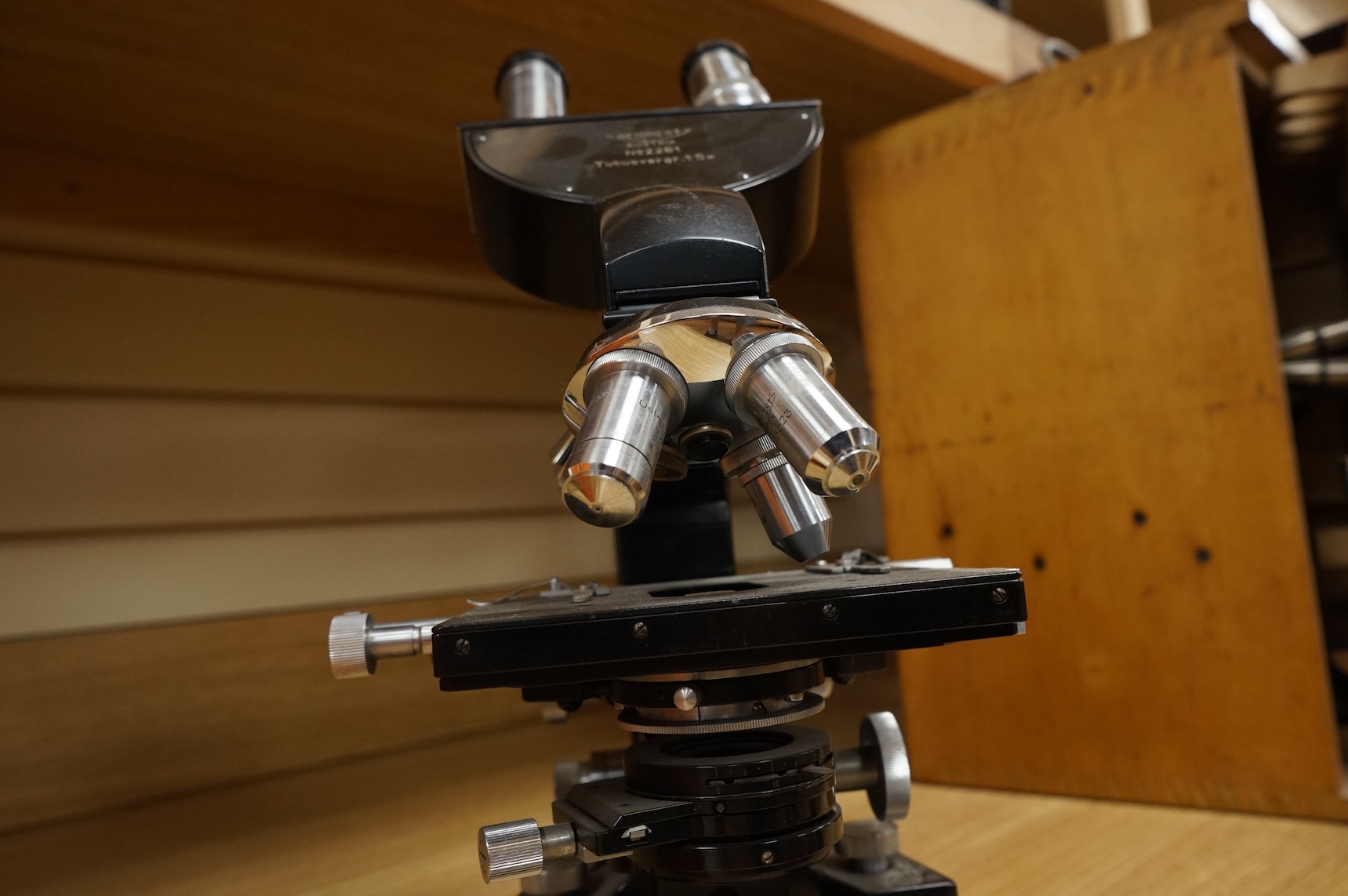 A mid 20th century Reichert, Austria binocular microscope, 34cm high.